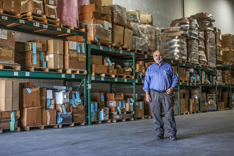 alta max security seals military packaging seo man posing in warehouse