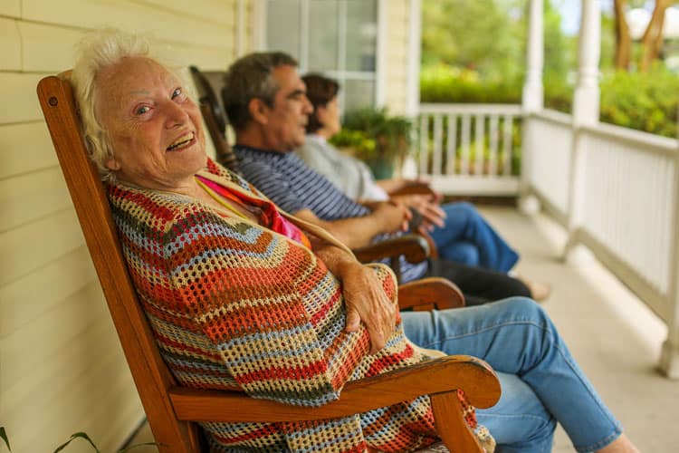 St Francis Villa Assisted Living responsive web design seo elderly people sitting on porch